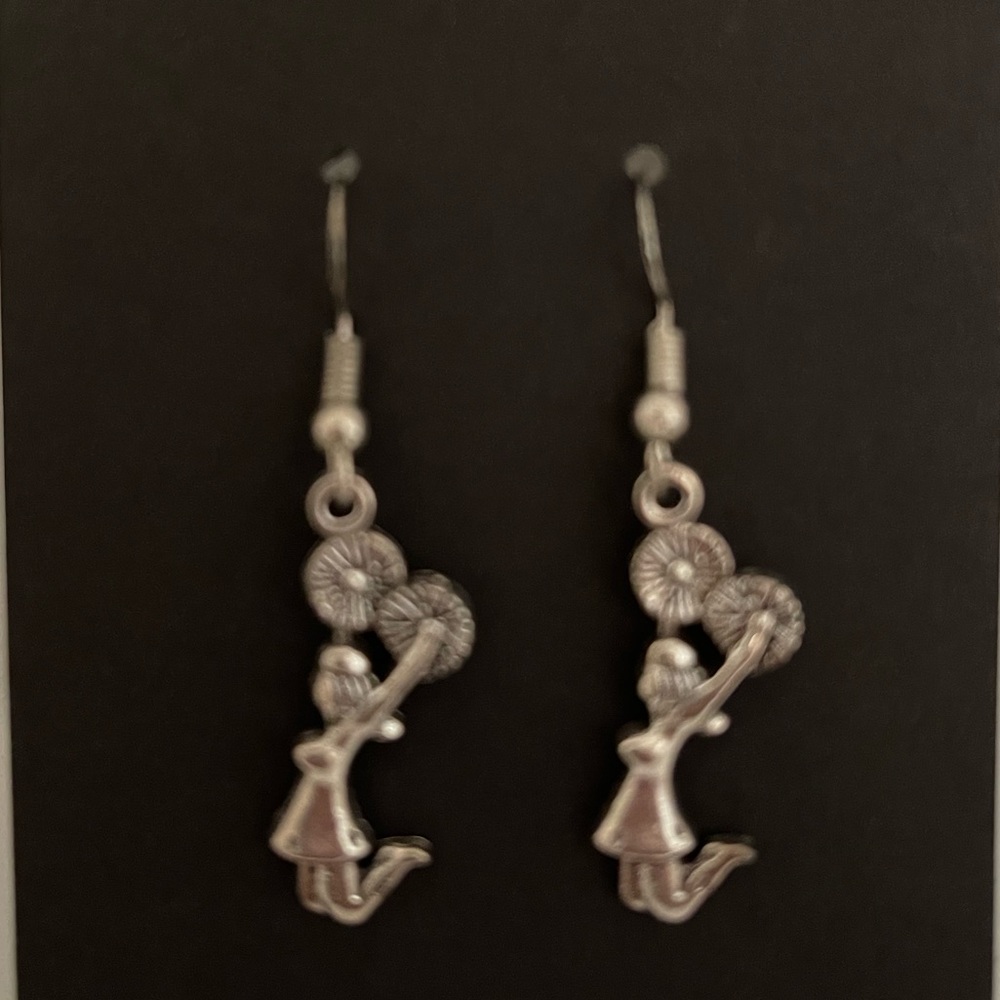 Handcrafted drop down dangle cheerleader earrings.